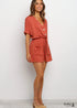 Mono bohemio rojo y verde Nina